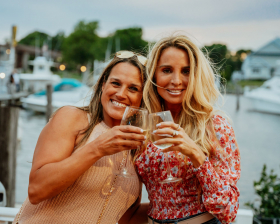 People enjoying drinks at The Oar